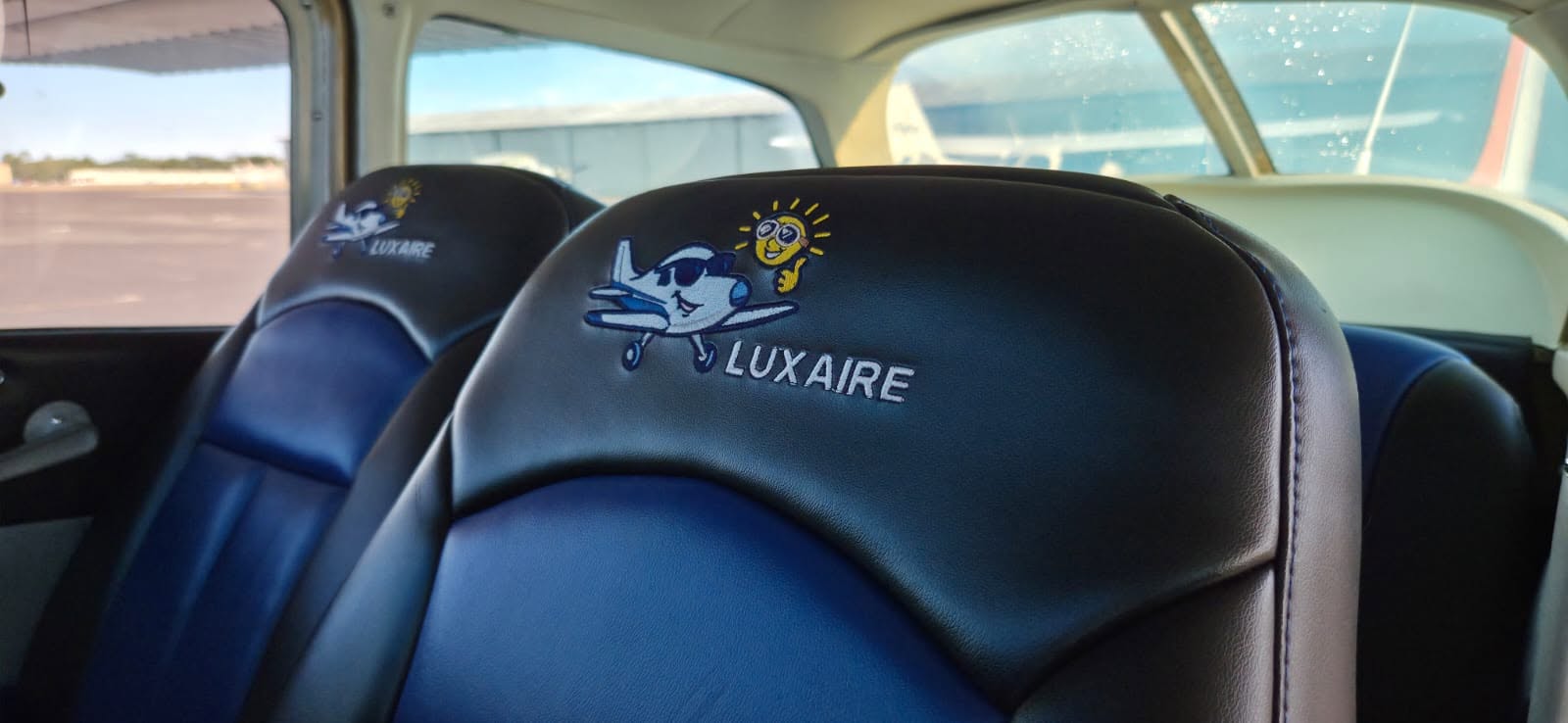 Custom Luxaire-embroidered leather seats in Cessna 172 N84582